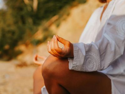 Close-up of hands in a specific yoga mudra.